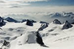 Photograph of snowy mountain tops